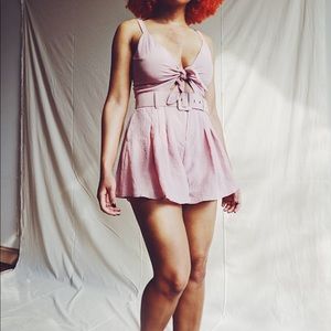 Pink romper with belt